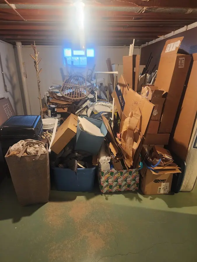 Roll-off dumpster container at job site for 20 Yard Dumpster Rental in Clermont